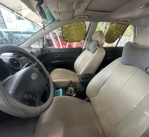 Xe Ô Tô Dùng Chung 07 Chỗ Ngồi; Nhãn Hiệu Kia Carens; Biển Kiểm Soát 92e-0959; Màu Sơn: Bạc; Số Khung: Rnyfg52129c005338; Số Máy: G4ka9h363114; Năm Sản Xuất/sử Dụng: 2009