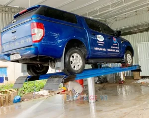 Cầu Nâng 1 Trụ Rửa Xe Lắp Nổi Chữ H Ấn Độ Airtek – Giải Pháp Tối Ưu Cho Garage Chuyên Nghiệp