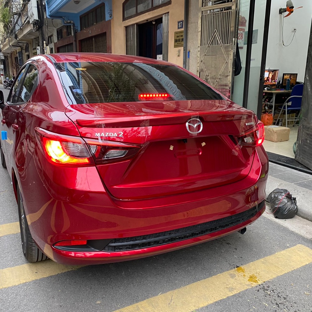 cánh gió mazda 2 - Hình 2