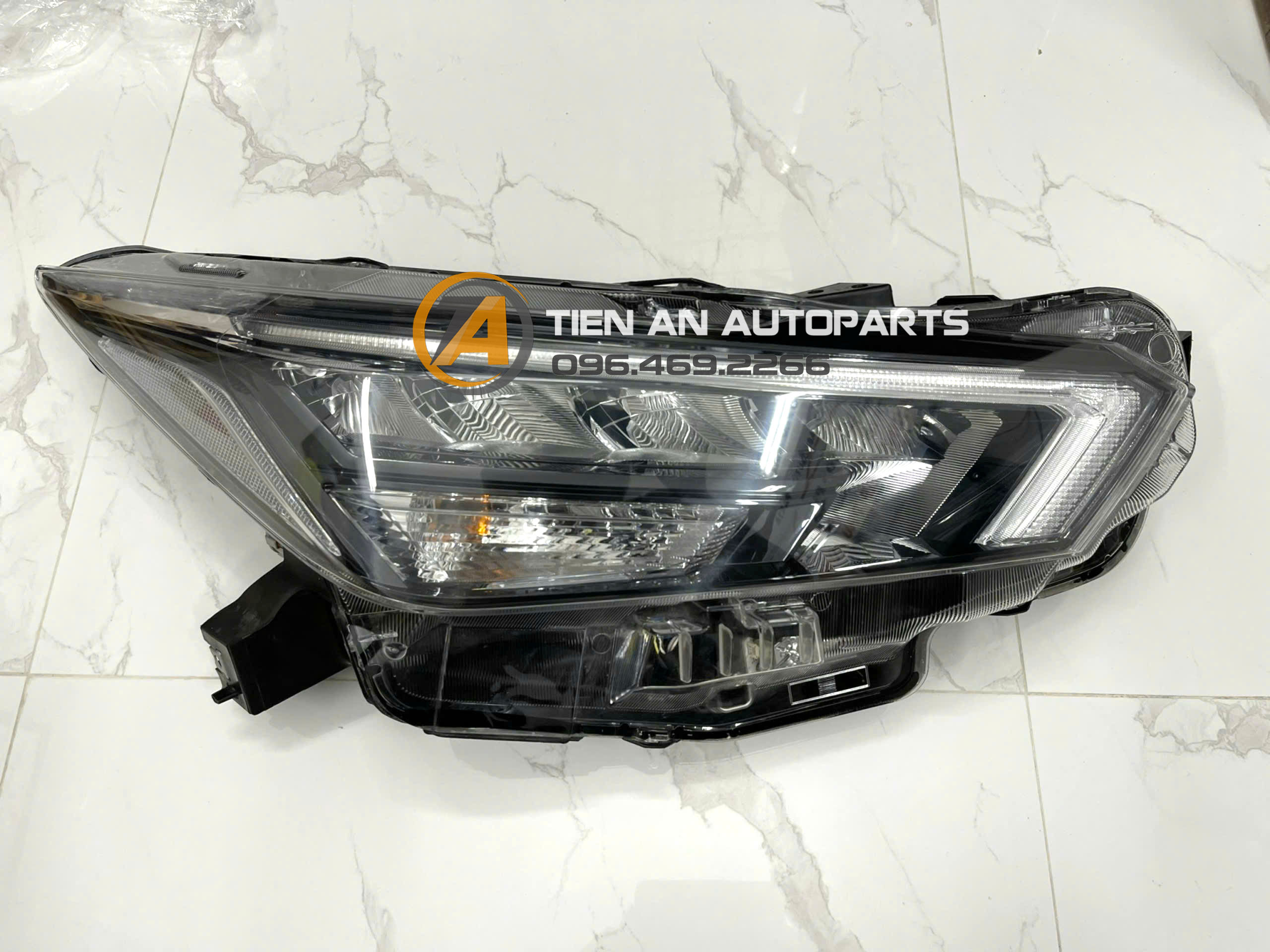 đèn pha nissan almera - Hình 5