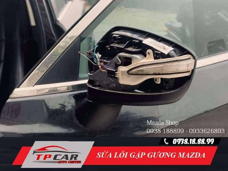 gương mazda 3 bị kẹt - Hình 3