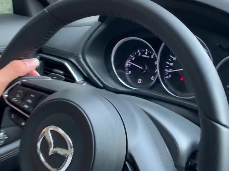 lẫy chuyển số trên vô lăng mazda 3 - Hình 5