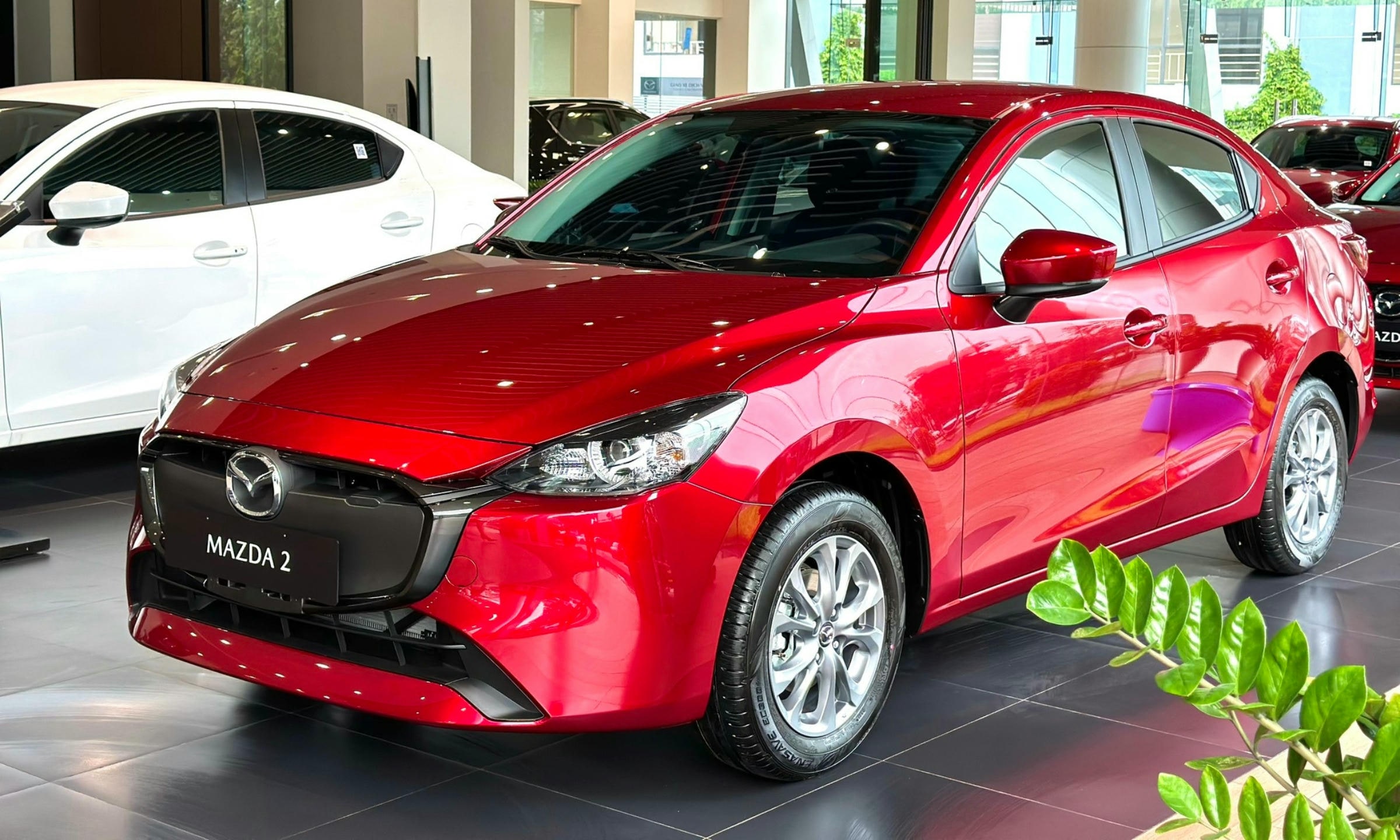 mazda 2 có cửa sổ trời không - Hình 4