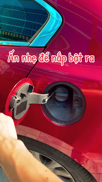 mở nắp xăng mazda 3 - Hình 1