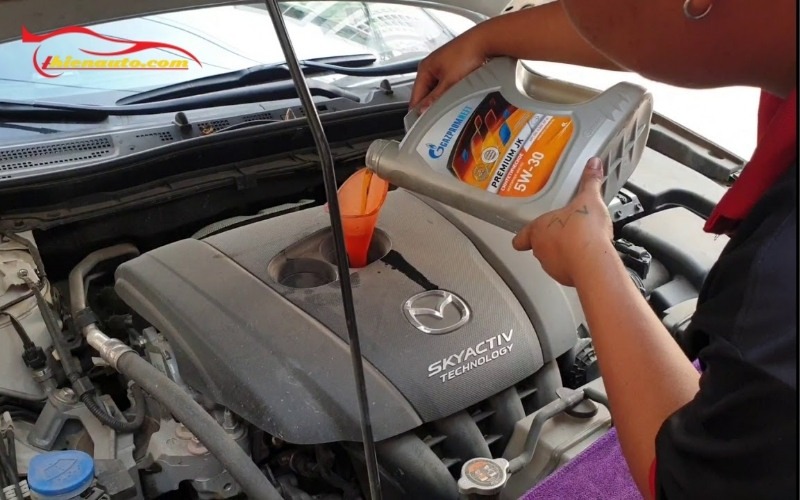 thay dầu xe mazda 3 - Hình 2