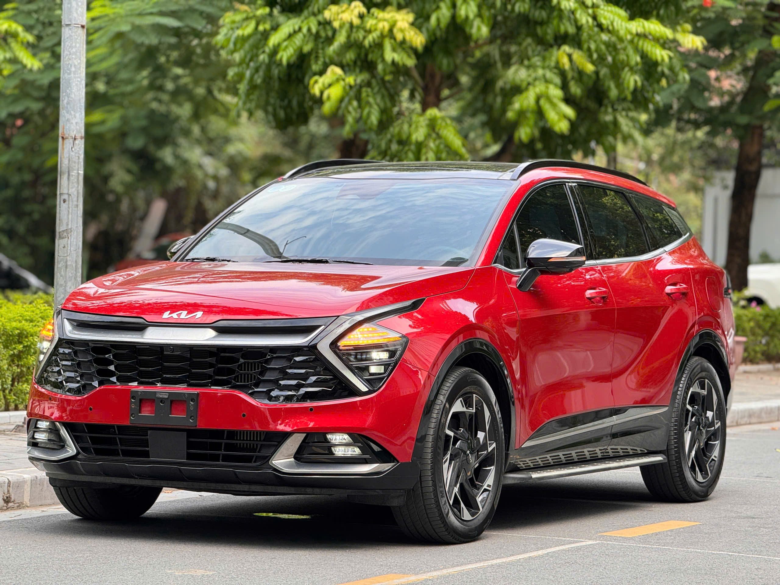 kia sportage đỏ - Hình 1