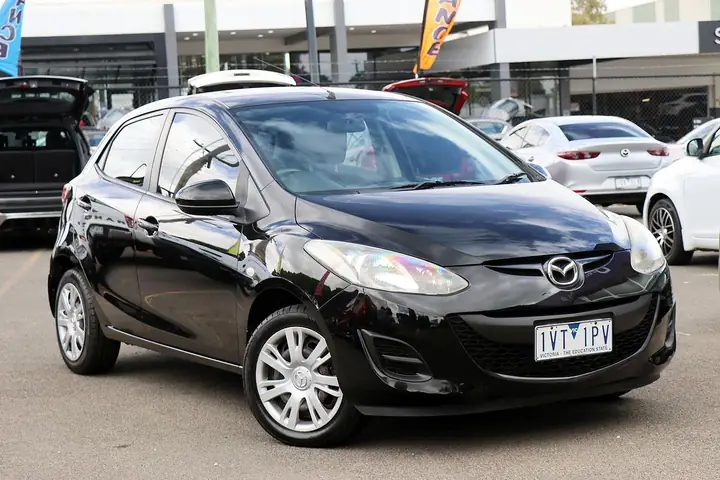 So Sánh Giá Và Thông Số Mazda 2 2013 Cho Người Mua Thông Minh