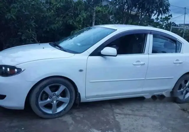 Xe Mazda 3 2005 Màu Trắng: Hướng Dẫn Chi Tiết Cho Người Mua Và Lưu Ý Quan Trọng
