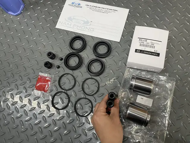 Chụp Bụi Piston Thắng Mazda: Hướng Dẫn Chi Tiết Và Lưu Ý Quan Trọng