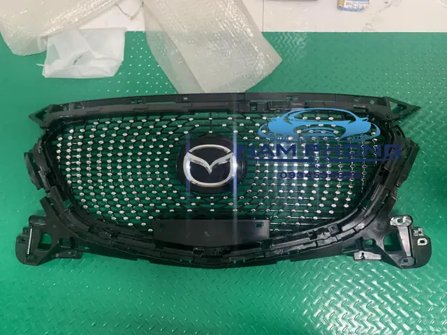 Mặt Ca Lăng Sao Rơi Mazda 2: Hướng Dẫn Thay Thế Và Lưu Ý Quan Trọng