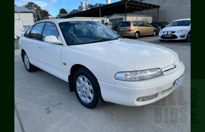 Mazda 626 1994: Cỗ Máy Thời Đại - Tổng Quan Chi Tiết Về Dòng Sedan Gia Đình Huyền Thoại