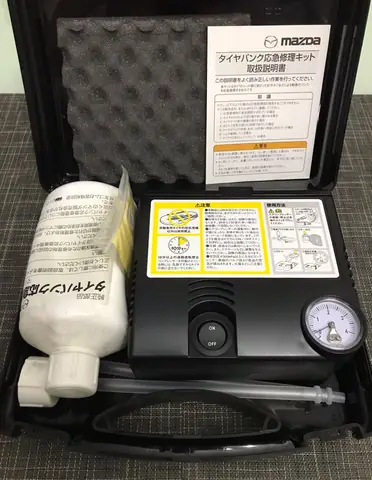 Cách Dùng Bộ Sửa Lốp Khẩn Cấp Mazda Hiệu Quả