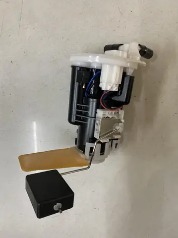 Mazda 323 Có Mùi Xăng Sống: Nguyên Nhân & Khắc Phục