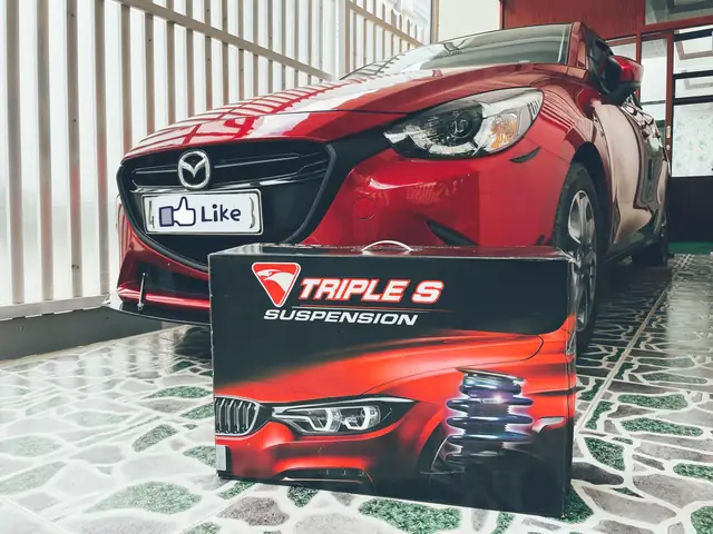 Nâng Lo Xo Giảm Xóc Xe Mazda: Tìm Hiểu Chuyên Sâu & Hướng Dẫn Chi Tiết