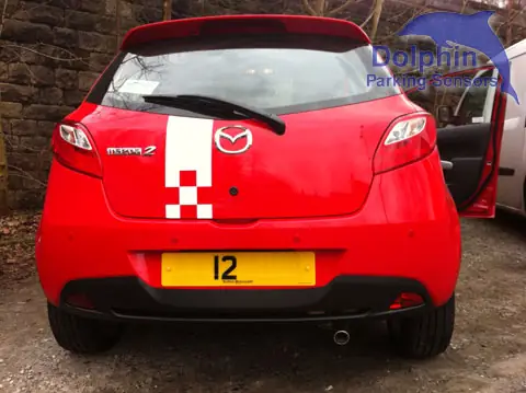 Cảm Biến Đỗ Xe Màu Đỏ Trên Xe Mazda: Hiểu Rõ Và Khắc Phục Sự Cố