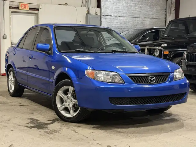 Hướng Dẫn Mua Xe Oto Mazda Protege Cũ: 10 Điều Cần Biết