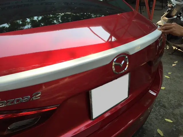 Đuôi Gió Liền Cốp Mazda 2 Tại Hà Nội: Hướng Dẫn Chi Tiết Và Địa Chỉ Uy Tín