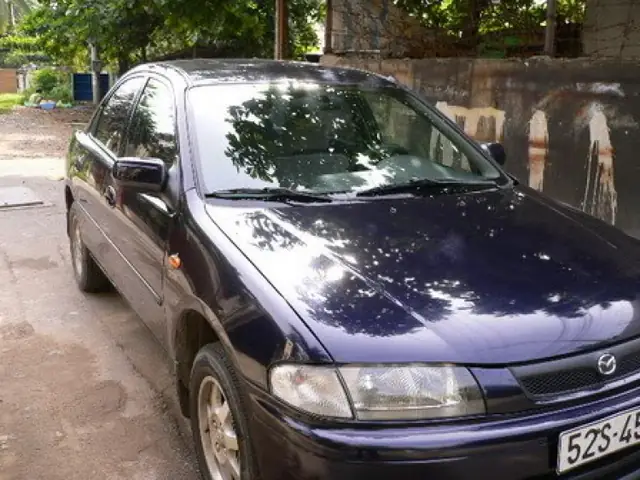 Mazda 323 Đời 1988-1990 Màu Ghi: Cái Nhìn Toàn Diện Cho Người Yêu Xe Cũ