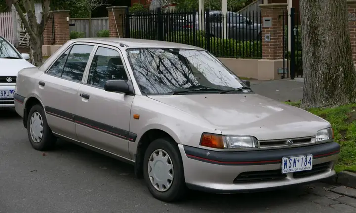 Mazda 323 Đời 1988-1990 Màu Ghi: Cái Nhìn Toàn Diện Cho Người Yêu Xe Cũ
