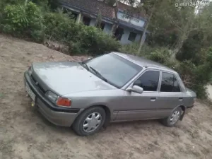 Mazda 323 Đời 1988-1990 Màu Ghi: Cái Nhìn Toàn Diện Cho Người Yêu Xe Cũ